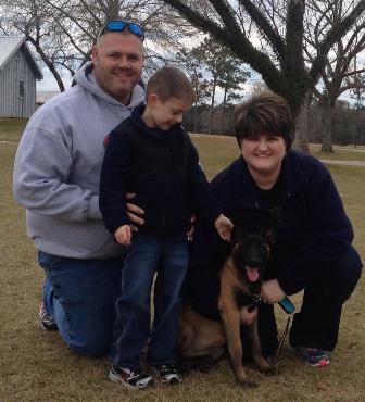 the Hebert family and their psd puppy Dixie